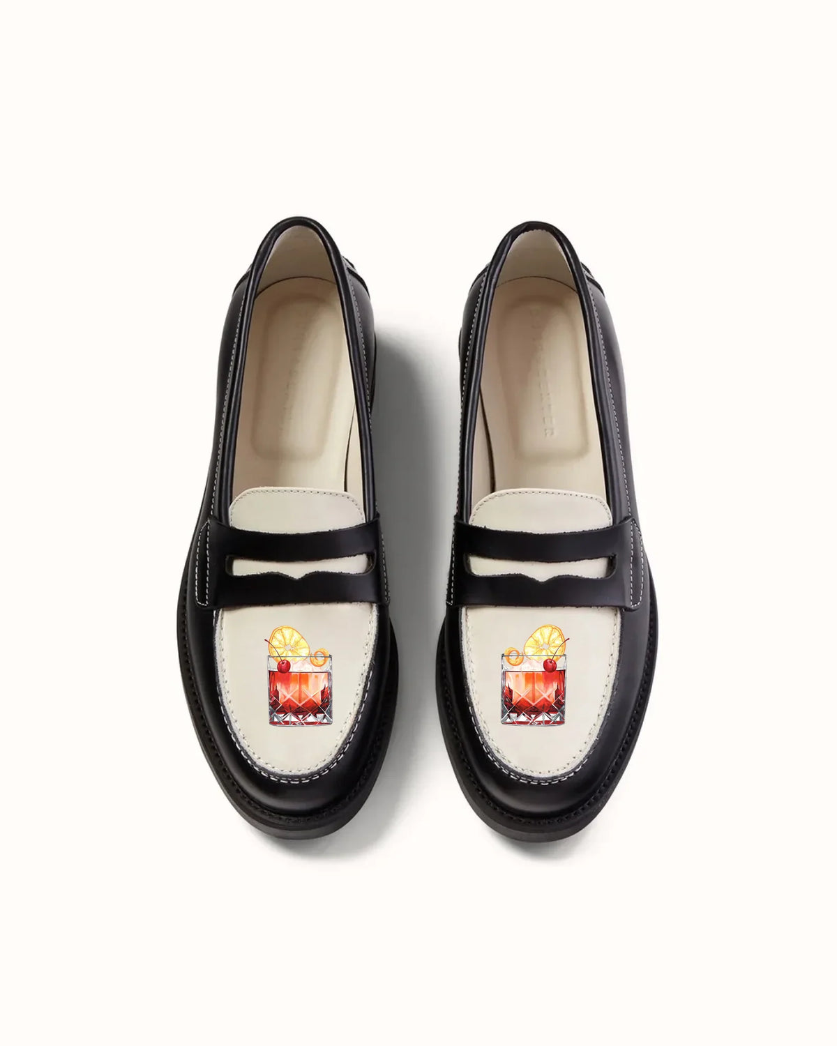 Wilde_Black_White_Penny_Loafer_-_Women_s-3_a5004d85-9f29-4844-ae99-44716de6f662_1000x