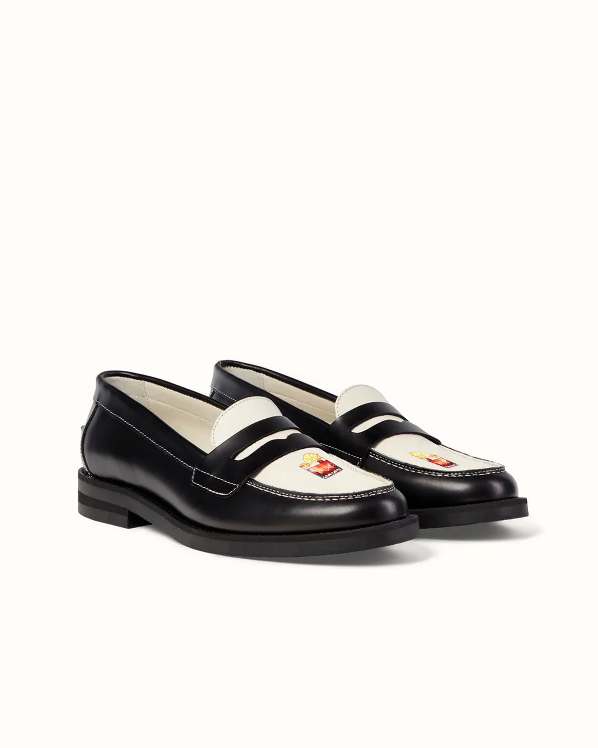 Wilde_Black_White_Penny_Loafer_-_Women_s-1_5cb32c49-a53b-450c-9fd8-57b3600fb7e1_1000x